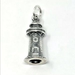 James Avery “Beacon of Light” Lighthouse charm.